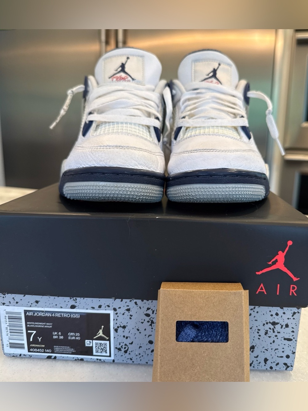 Jordan Retro 4’s White & Midnight Navy 7Y Sneakers